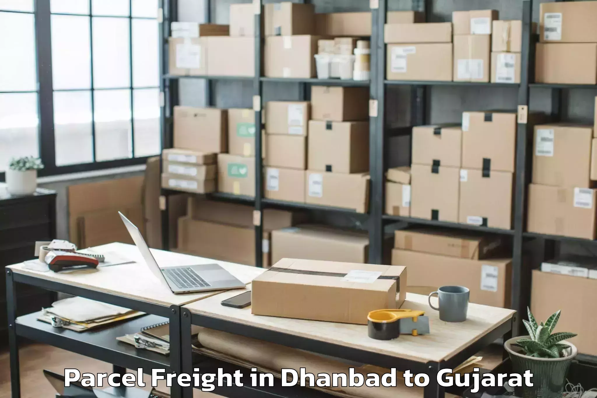 Book Your Dhanbad to Visnagar Parcel Freight Today